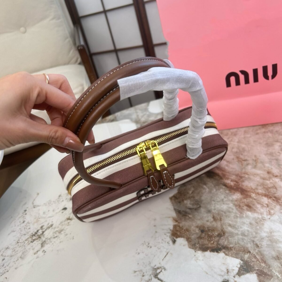 ⁦حقيبة ميوميو القماشية المخططة⁩ - الصورة ⁦3⁩