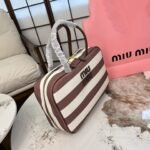 ⁦حقيبة ميوميو القماشية المخططة⁩ - الصورة ⁦2⁩