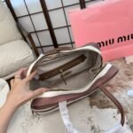 ⁦حقيبة ميوميو القماشية المخططة⁩ - الصورة ⁦7⁩