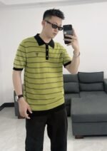 قميص بولو برادا الجديد المخطط بألوان متباينة مع شعار قصير مطرز