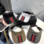 قبعة غوتشي الأصلية ذات الشريط العريض المجوف الأحدث.